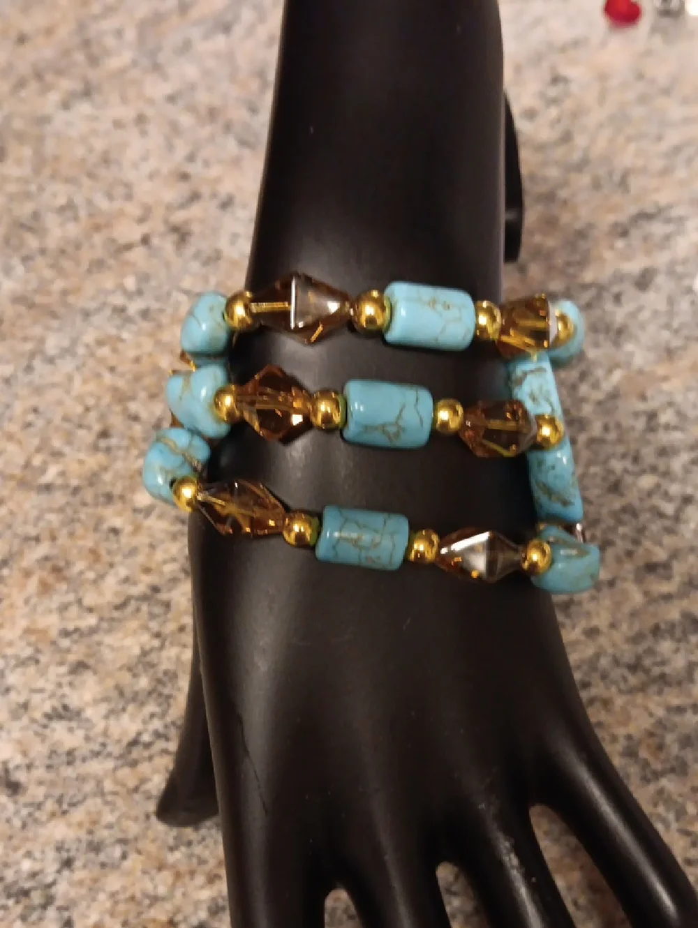 Handmade BEADED THREE TIER TURQUOISE AND Gold GLASS BEADED BRACLET